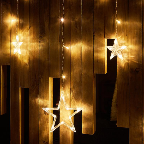 Гирлянда светодиодная "Занавес" ULD-E3007-138/DTA WARM WHITE IP20 STARS-2 3х0.7м 138LED тепл. бел. провод прозр. Uniel UL-00009939